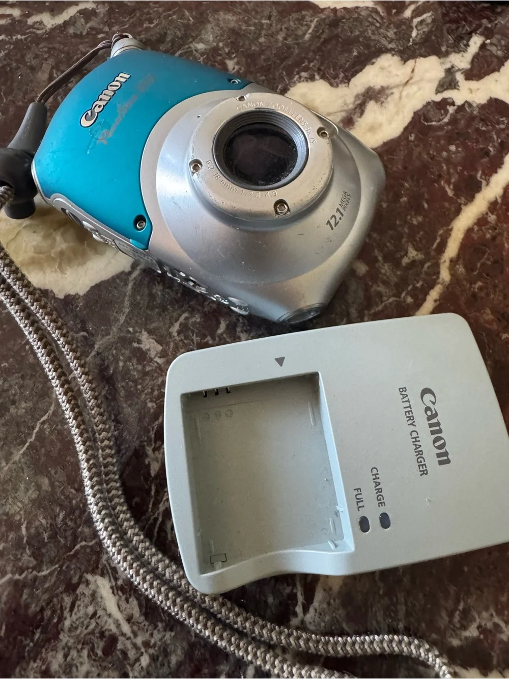 Canon PowerShot D10 12.1MP Waterproof Digital Camera + Canon Battery Charger